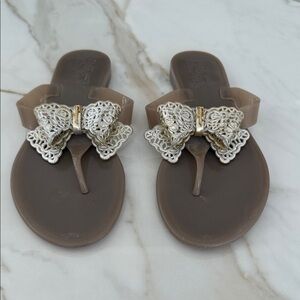 Salvatore Ferragamo Brown Sandals with Silver Bow Accent